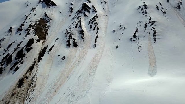 Aerial images of avalanches in the mountains of the French Pyrenees. Avalanche ferns during spring. Recording with a full HD pro mavic.