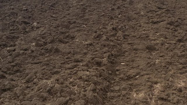 Fertile soil after being ploughed 4K drone footage