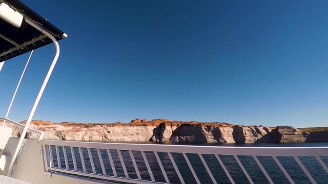 View from a houseboat as it travels down the shoreline of Lake Powell, Page Arizona.