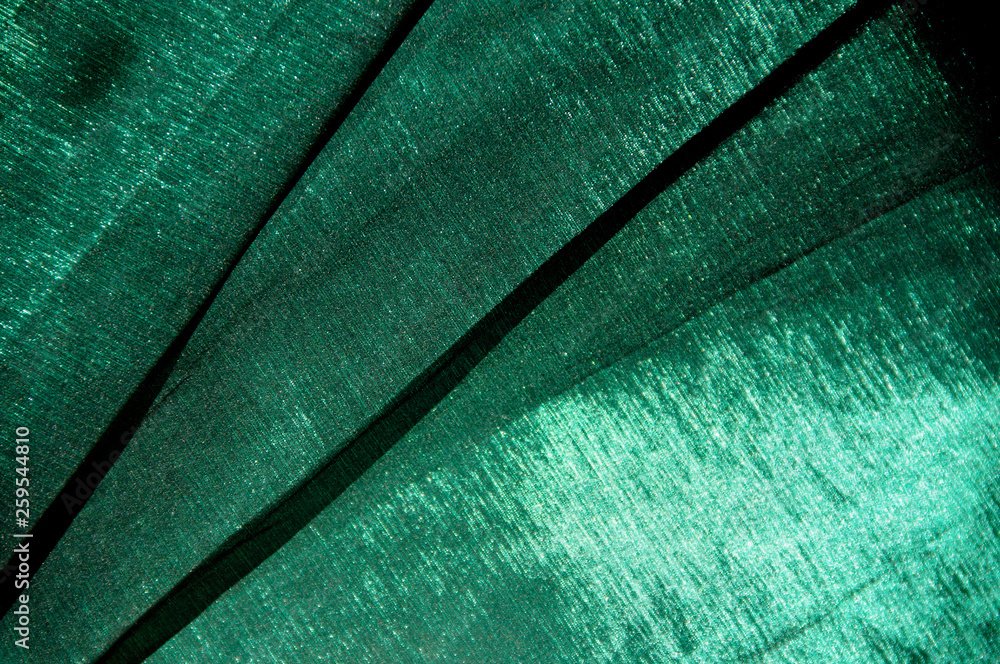 Wall mural closeup of green taffeta gown