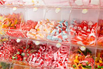 Variety of colored sweets on the store shelves