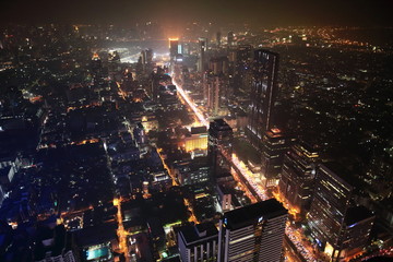 Bangkok, Thailand- December 31, 2018 ; Bangkok night skyscraper from rooftop of The Kingpower Mahanakorn Tower under dust pollution.