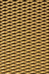 Golden background from sheet metal with pattern