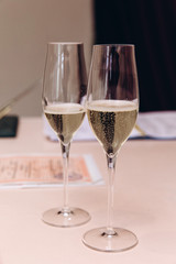 Wedding table. Champagne in glasses. 