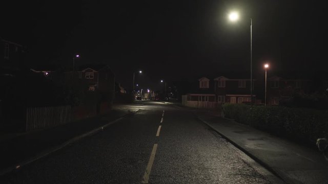 A typical town street in the UK at night