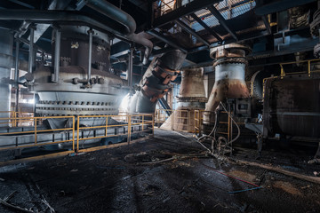scene and details of an abandoned steel furnace building