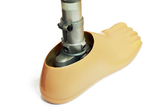 Close up of unrecognizable prosthetic leg on white backgroung - with clipping path