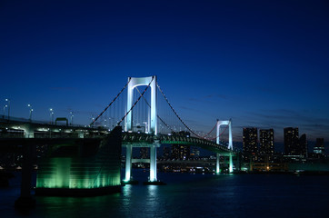 rainbow bridge of Tokyo illuminated in night