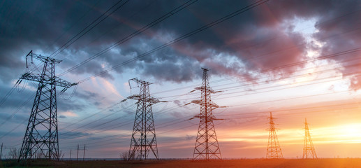 Electrical substation silhouette on the dramatic sunset background