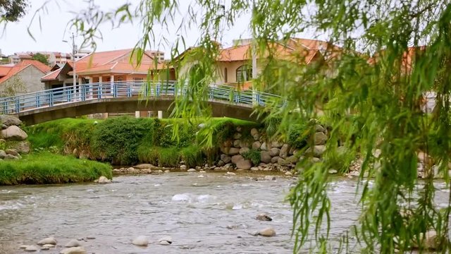 Bridge in Cuenca Ecuador with river in foreground