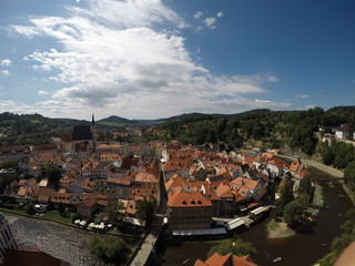 European Old Ancient Castle in Cesky Krumlov in the Czech Republic. Historical centre. A single color of roofs. Nature in old European city. Summary photos of the city. Beautiful old architecture.