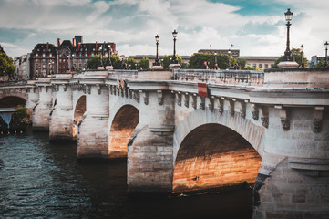 Obraz premium The beautiful Pont Neuf in Paris on a sunny day - Paris, France