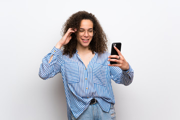 Dominican woman with striped shirt making a selfie