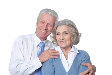 Portrait of happy senior couple on white background