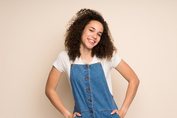 Dominican woman with overalls smiling