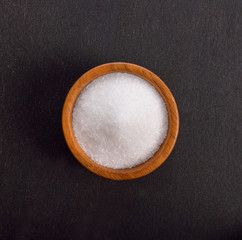 monosodium glutamate on black  background