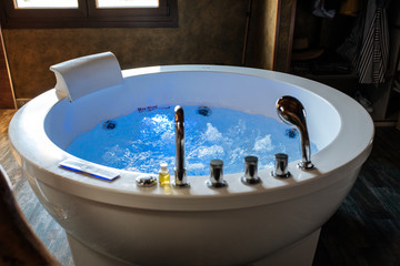 Modern beautiful hydro massage bath with water