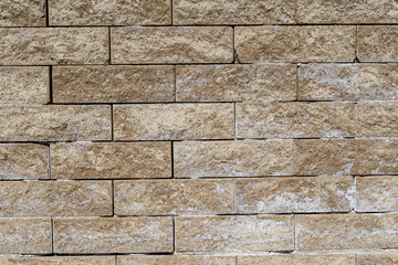 Background of old beige brown bricks in horizontal display
