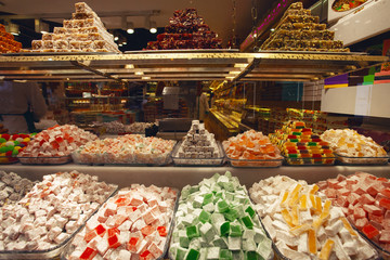 Bunch of colorful turkish delight arrangement plates in Istanbul dessert shop. Outdoor shot
