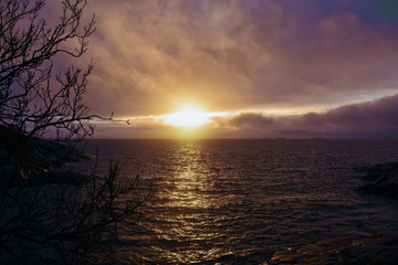 Fototapeta na wymiar clouds sunset over sea in Norway 