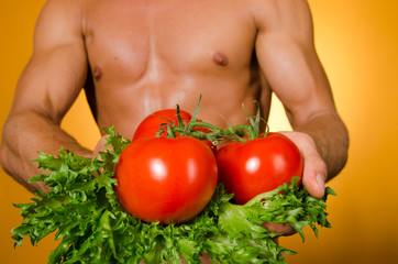 Healthy lifestyle. Sexy guy. Bright background.