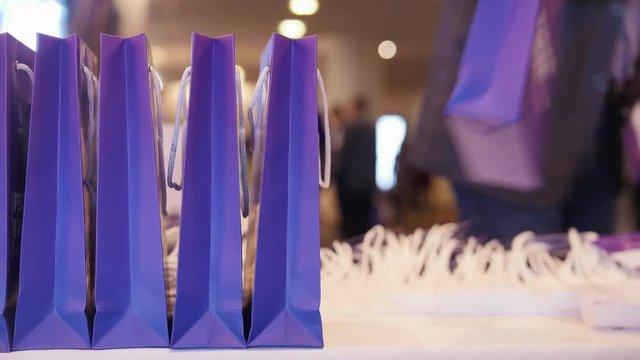 A business conference and presentation. Purple present package on a foreground