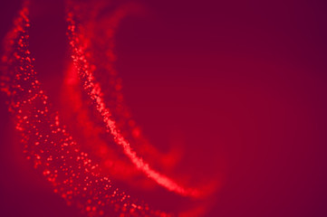 Glitter abstract lights red background. Defocused bokeh illustration