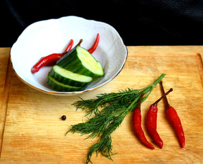 chili pepper and spices on wooden background