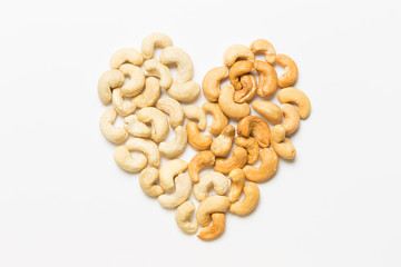 Composition of dry and roasted cashews in the shape of a heart