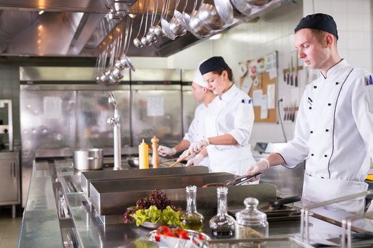 work of a group of chefs in a luxury restaurant.