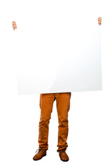 Handsome man with beard holding an empty placard