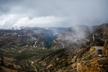 Fototapeta na wymiar This is a capture for Bchareh and Kadicha Valley during winter in north Lebanon the shot was taken in late march 2019 and you can see the beauty of the nature and the mountains