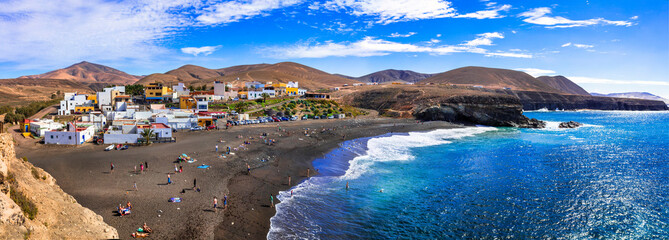 Fuerteventura - picturesque traditional fishing village Ajui, with black beach. Canary islands