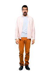 Fototapeta premium Full-length shot of Handsome man with beard with surprise facial expression over isolated white background