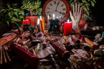 Magic occult background with candles, clock, incense sMagic occult background with candles, clock,...