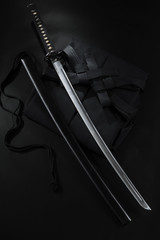 Japanese katana samurai sword. Aikido hakama, martial arts uniform