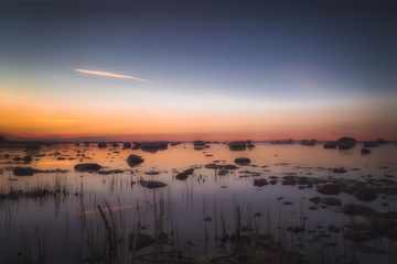 Beautiful seascape with stones. Sunset at the Baltic sea