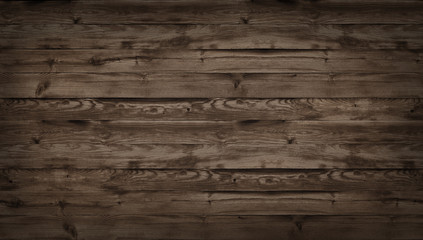 Brown wood texture, top view of wooden table. Dark wall background, texture of old top table,...