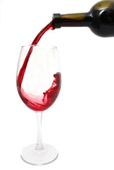 Pouring red wine into the glass