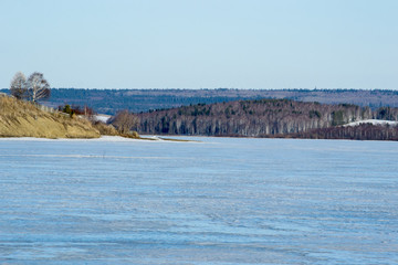 Fototapeta na wymiar Winter landscape on a frozen lake