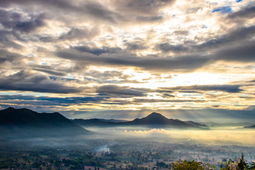Sunrise at Phu Thok, view misty morning  around with mist and cloudy sky,  beautiful mountain. Khan District, Loei, Thailand