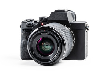 Fototapeta premium Camera isolated on white background with clipping path. Mirrorless camera isolated on white background. Clipping path for design and artwork.