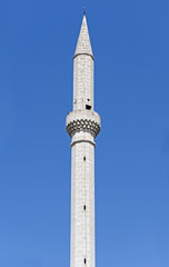 minaret against a clear blue sky