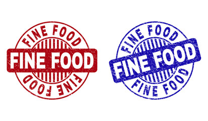Grunge FINE FOOD round stamp seals isolated on a white background. Round seals with distress texture in red and blue colors. Vector rubber imprint of FINE FOOD label inside circle form with stripes.