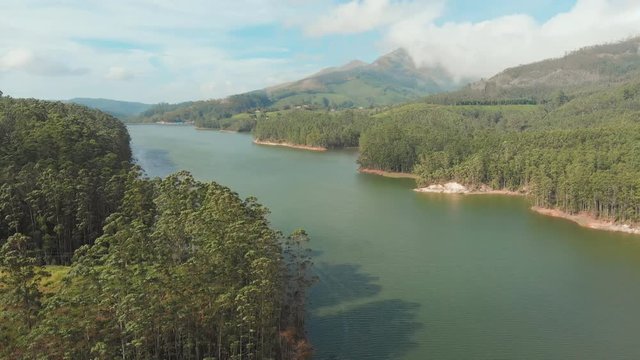 Aerial view beautiful nature with mountains and hills by Lake Mattupetty. Kerala State. Near the city of Munar.