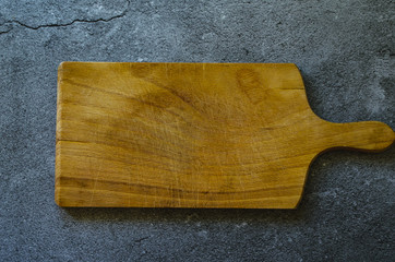 Wooden board on marble background