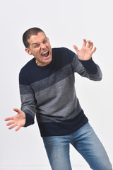 man screaming and raging on white background