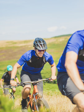 Mountain Biker Smiling With Friends