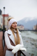 Girl standing near a railing