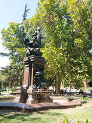 Fototapeta na wymiar Statue of Vicuña Mackenna, work of the sculptor Jules-Félix Coutan, in the square of the same name, in the center of Santiago, Chile, next to Santa Lucía hill